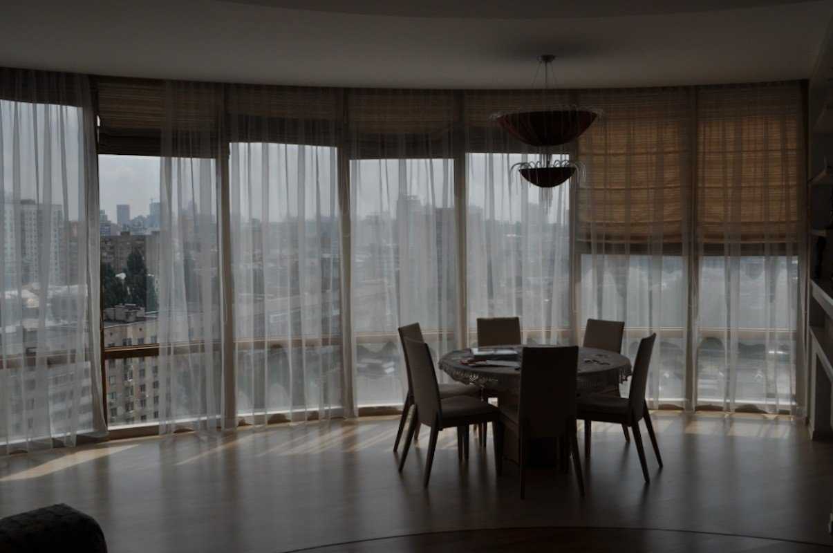Шторы на панорамное окно в квартире enclave in the clouds